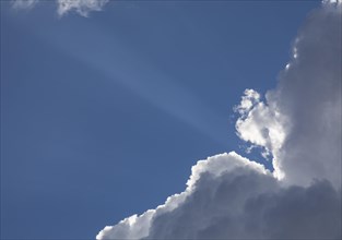 Sunbeam breaks through cloud