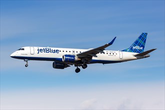 A JetBlue Embraer 190 aircraft with registration N283JB at New York John F Kennedy