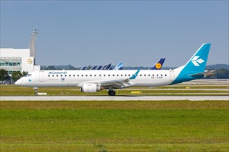 An Air Dolomiti Embraer ERJ195 with registration number I-ADJM at Munich Airport