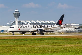 An Air Canada Boeing 787-9 Dreamliner aircraft with registration C-FVLQ and Fly The Flag special livery at Munich Airport