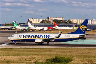 A Ryanair Boeing 737-800 aircraft with registration number 9H-QCG at the airport in Lisbon