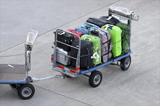 Baggage trolley with suitcase