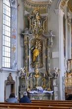 Side altar with figure of the Virgin Mary