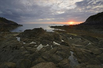 Sunrise on the rocky beach