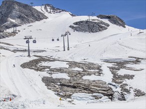 Glacier polish under melted ski slope