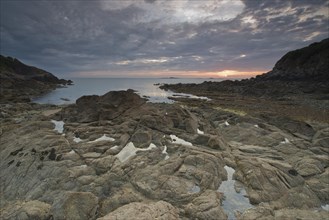 Sunrise on the rocky beach