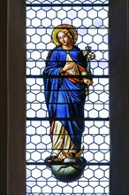 Leaded glass window with figure of the Virgin Mary