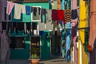 Clotheslines with colourful houses