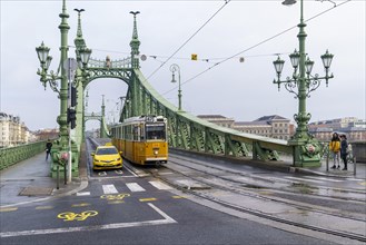 Tram and taxi on Freedom Bridge