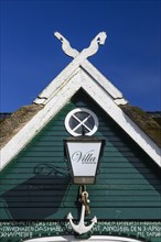 Half-timbered gable of a thatched house at Duemmer