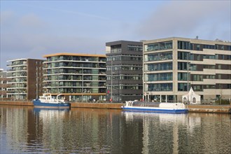 Modern commercial buildings in the new harbour