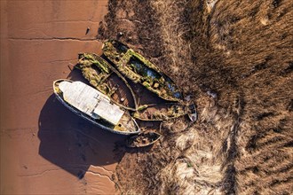 Top Down view over Old Boat Wrecks on the River Exe in Topsham