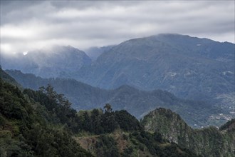 Mountain landscape with low clouds near Porto da Cruz