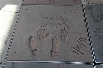 Handprints and footprints of STEVEN SEAGAL
