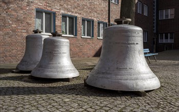 The old church bells in front of the entrance to the Lutheran Matthaeuskirche in Steglitz