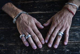 Men's hands with silver jewellery