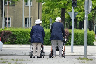 Two elderly ladies from behind