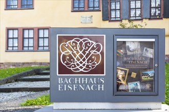 Sign on the Bach House with its seal and information about the museum