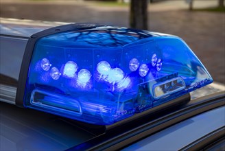 Turned on blue light on police car in Dorfen