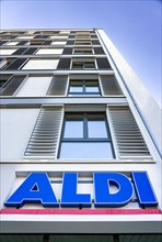 Logo of the Aldi discount store on a new building in Mitte