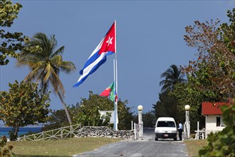 Entrance to the hotel complex with Cuban flag