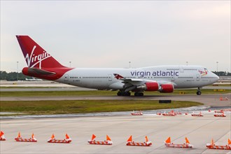 A Virgin Atlantic Boeing 747-400 aircraft with registration G-VROY at Orlando Airport