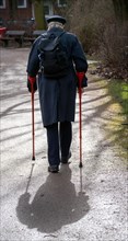 Old man with crutches