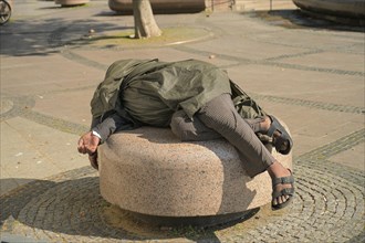 Sleeping homeless man