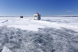 Ice fishing huts on the frozen Saint Lawrence River
