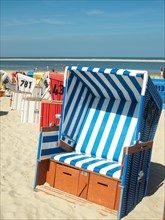 Blue-striped beach chair