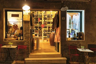 Shop for clothes and wine in Bolgheri