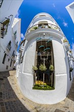 Corner house photographed with fisheye in the small Andalusian town of Vejer