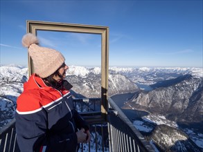 Tourist admires winter landscape at Five Fingers viewpoint