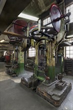 Drop forge with screw presses in a former valve factory