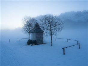 Chapel in front of Grimming in the morning mist