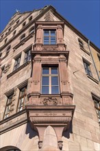 Multi-storey oriel on a residential and commercial building in the neo-Renaissance style