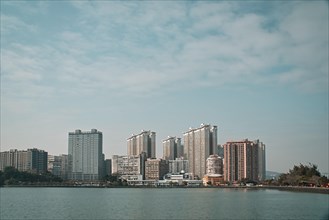Tall buildings by water in Macau