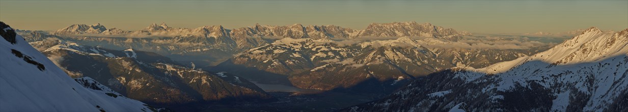 View from Mount Kitzsteinhorn on snow covered mountains down to Zell am See