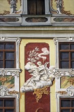 Fresco with angels on facade