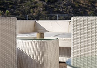White wicker furniture on the terrace