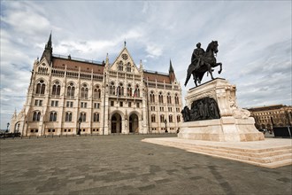Parliament building on Kossuth Square with equestrian statue of Andrassy Gyula