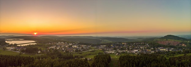 Panorama aerial view of the health resort Altenberg in the district of Saechsische Schweiz-Osterzgebirge at sunset