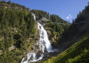 Hiking trail over a suspension bridge along the Stuibenfall near Umhausen