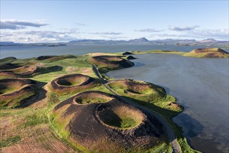 Aerial view of green volcanic crater