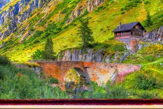 Picturesque old stone bridge in the mountain landscape. Ladstaffel