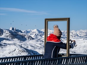 Tourist admiring winter landscape at Five Fingers viewpoint