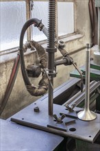 Valve welding machine in a former valve factory