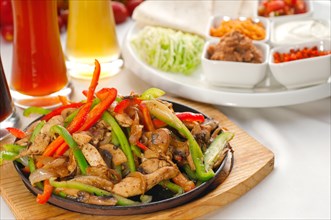 Original fajita sizzling smoking hot served on iron plate