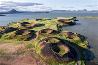 Aerial view of green volcanic crater