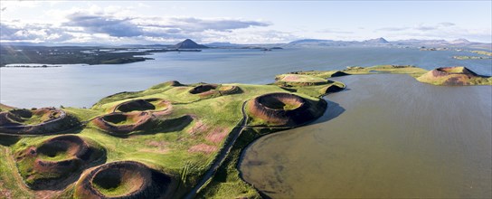 Aerial view of green volcanic crater